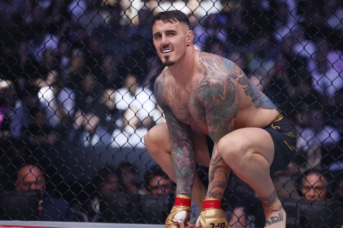 Том Аспиналл