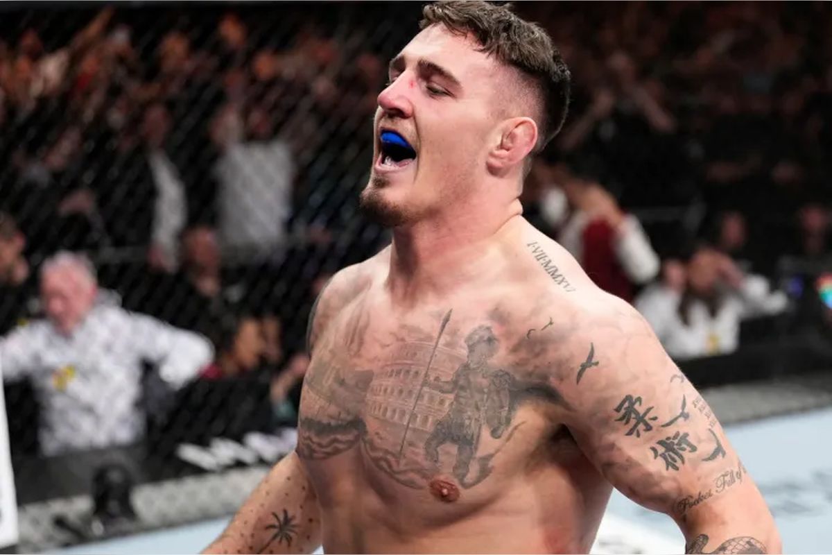 Том Аспиналл