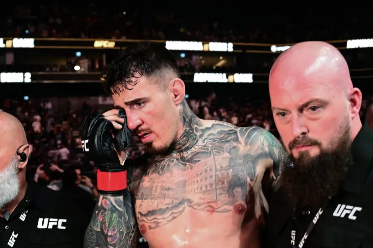 Том Аспиналл